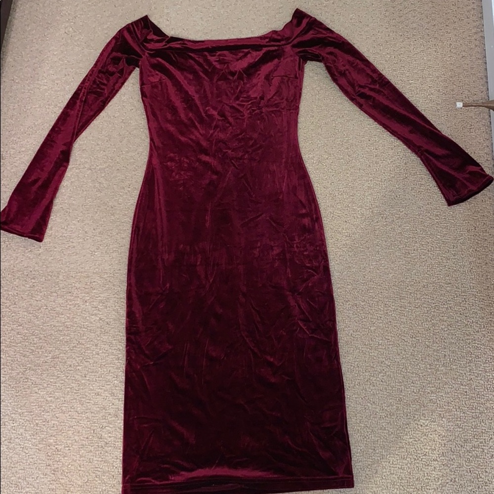 Red velvet off the shoulder dress.